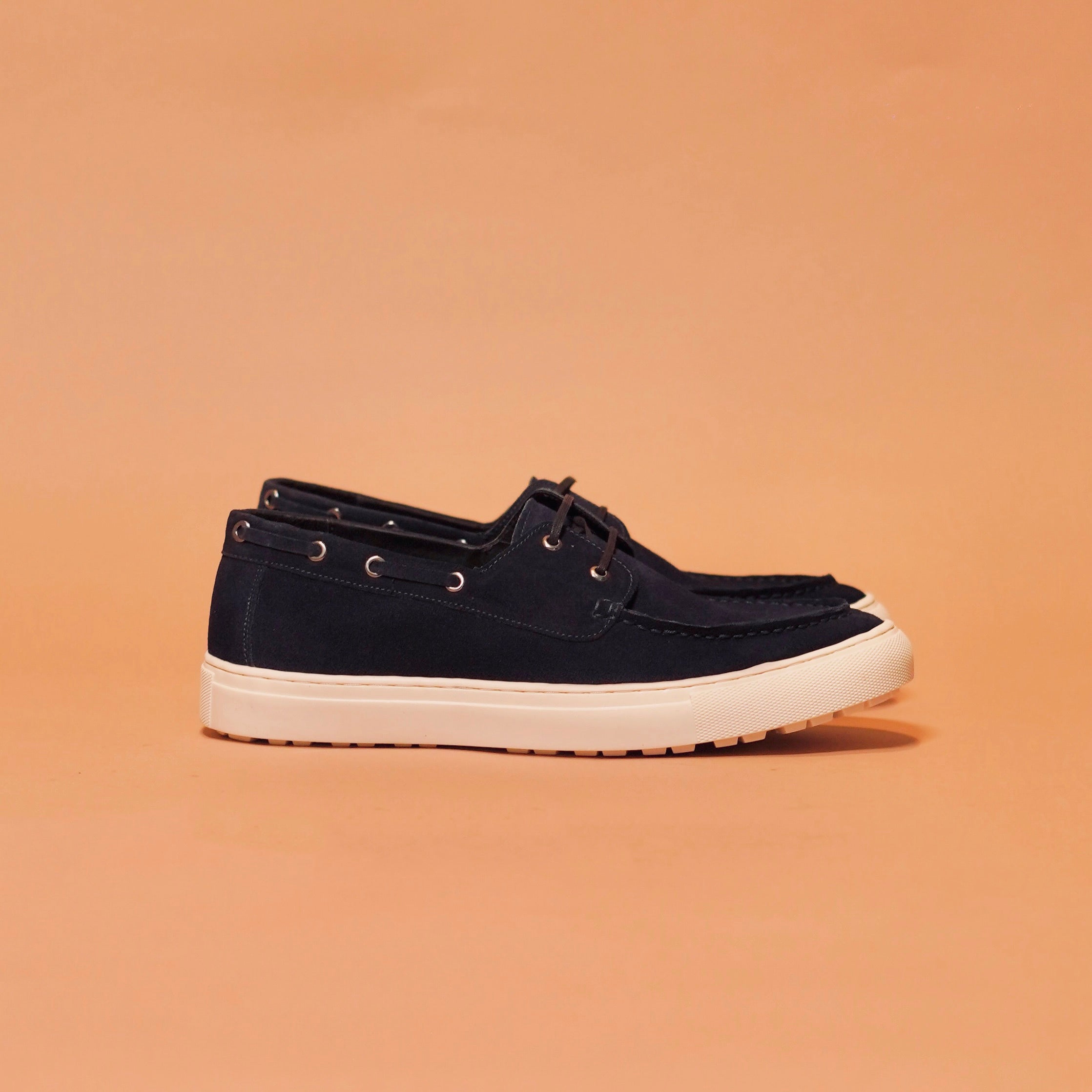 Side view of Barco Celesto boat shoe with blue suede
